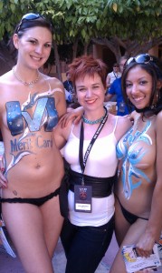 2 sexy women with their breast painted with Lauren MacEwen