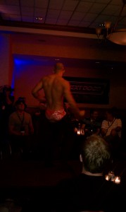 Auctioning off underwear for the charity, man dancing in his underwear